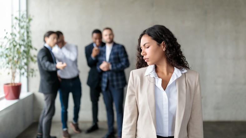 A person in a beige suit

AI-generated content may be incorrect.